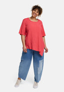 Tunica 'Crissa' – plissettata, leggera e modernamente asimmetrica