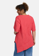 Tunica 'Crissa' – plissettata, leggera e modernamente asimmetrica