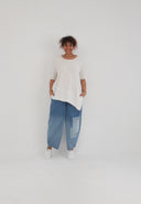 Tunica 'Crissa' – plissettata, leggera e modernamente asimmetrica